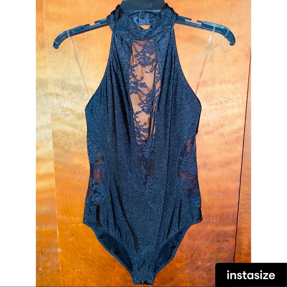 Black halter bodysuit with open back